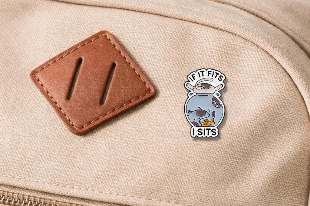 Playful Cat Fishbowl Enamel Pin – Cute Cat Carrying Fish Tank Brooch – Kawaii Animal Lapel Badge – Whimsical Pet Lover Jewelry Gift