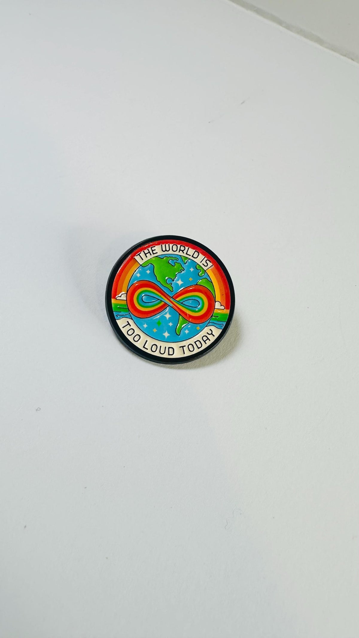 Neurodiversity Enamel Pin – “The World Is Too Loud Today” Metal Badge – Rainbow Infinity Earth Lapel Brooch – Autism Awareness Gift