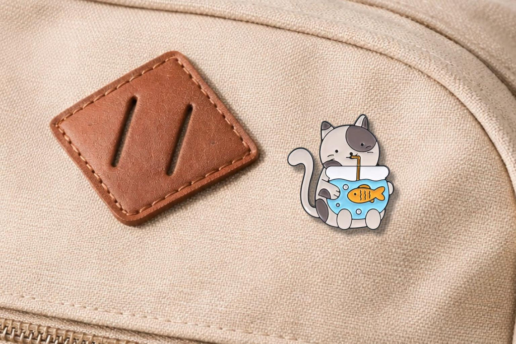 Playful Cat Fishbowl Enamel Pin – Cute Cat Carrying Fish Tank Brooch – Kawaii Animal Lapel Badge – Whimsical Pet Lover Jewelry Gift